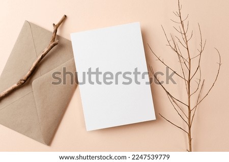 Greeting card or invitation mockup with envelope and natural twigs decorations, blank card mockup