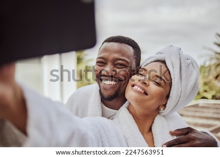 Happy, morning and black couple phone selfie moment with cheerful smile at hotel in South Africa. Wellness, relax and love of people bonding together with mobile photograph for social media.