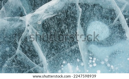 Frozen lake's surface during winter season at Russia, Europe. 