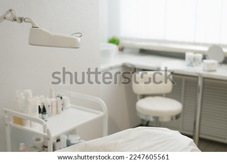 Interior of beautician room in aesthetic medicine salon. skincare saloon treatment Royalty-Free Stock Photo #2247605561