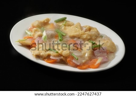 Garlic chicken, Is a popular Indo-Chinese delicacy all over India. Battered sea food, Chinese cuisine pictures, isolated on Black background.