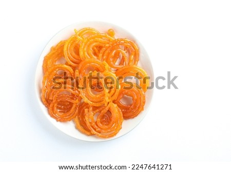 Indian most popular traditional sweet called Jalebi an Indian dessert made during festivals and celebrations in Indi Royalty-Free Stock Photo #2247641271