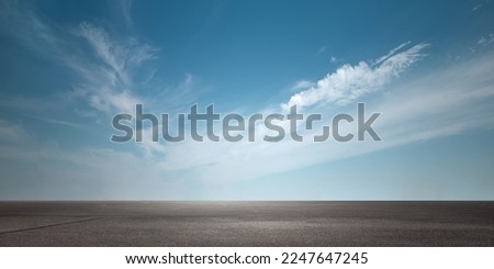 Beautiful Horizon Blue Sky with Subtle Clouds Background and Empty Floor Royalty-Free Stock Photo #2247647245