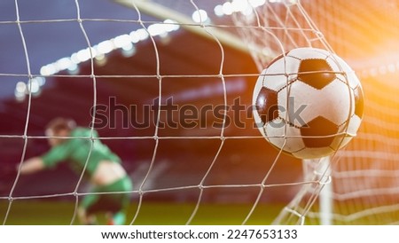 Football Championship: Ball Hits the Net. Goalkeeper Jumps and Fails to Protect Goals, Competition Scores Goal. Sport Channel Broadcast TV. Stylish Warm Cinematic Edit of International Tournament. Royalty-Free Stock Photo #2247653133