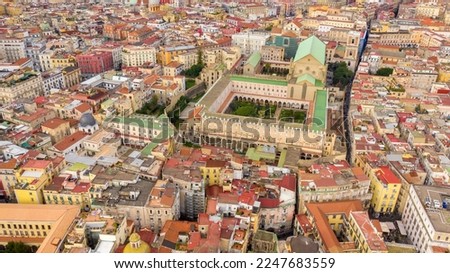Aerial view of the Basilica of Santa Chiara, a religious complex in Naples, Italy. The building includes a church, a monastery, tombs, an archaeological museum and a cloister with internal gardens. Royalty-Free Stock Photo #2247683559