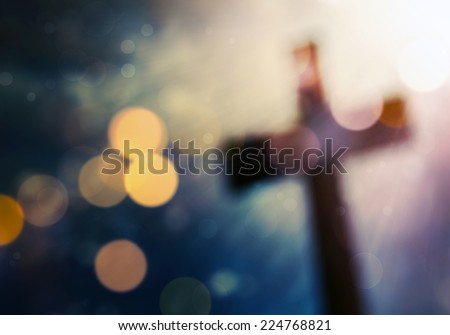 Beautiful bokeh with a cross in the background Royalty-Free Stock Photo #224768821