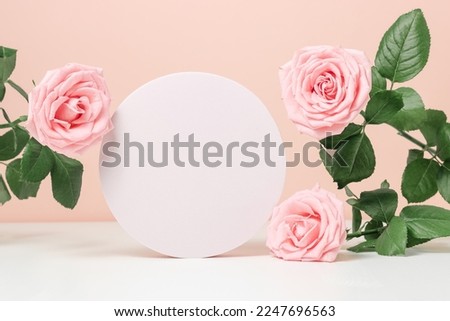 Podium with pink roses for product presentation. Abstract minimal round geometric form background, scene to show products