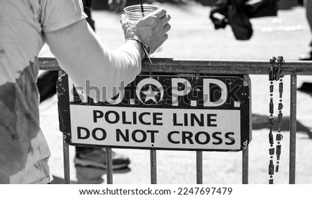 New Orleans Police Department - Police Line Do Not Cross sign for Mardi Gras event.