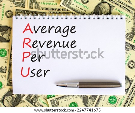 ARPU average revenue per user symbol. Concept words ARPU average revenue per user on white note on beautiful white background. Business ARPU average revenue per user concept. Copy space.