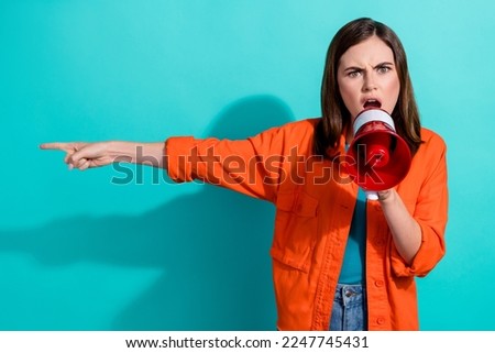 Photo of angry mad lady wear stylish clothes demand punishment for russian aggressor showing empty space isolated on cyan color background Royalty-Free Stock Photo #2247745431