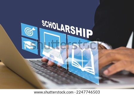 Scholarship concept, Student hand applying for scholarship for higher education.  Royalty-Free Stock Photo #2247746503