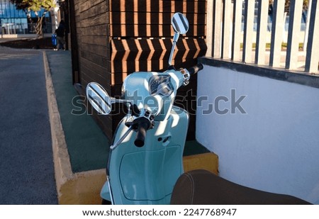 turquoise retro vintage scooter photo in detail, scooter in retro style