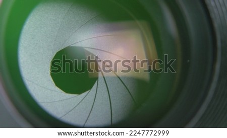 Detail of camera lens iris blades smoothly opening