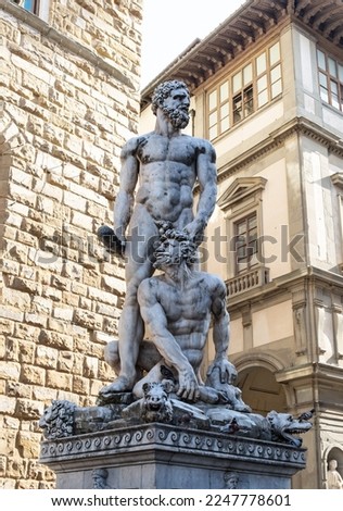 Statue of Hercules killing monster Cacus. The sculpture by Baccio Bandinelli on the Piazza della Signoria in front of the Palazzo Vecchio, Florence, Tuscany, Italy. Royalty-Free Stock Photo #2247778601