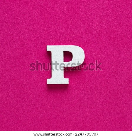 Letter P uppercase - White wood font on rhodamine red background