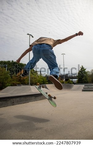 high resolution Photography of a man skateboarding