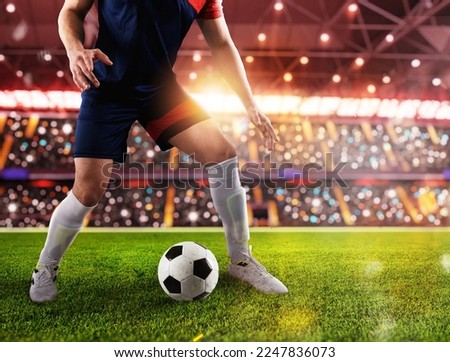 Soccer player ready to kick the soccerball at the stadium during the match