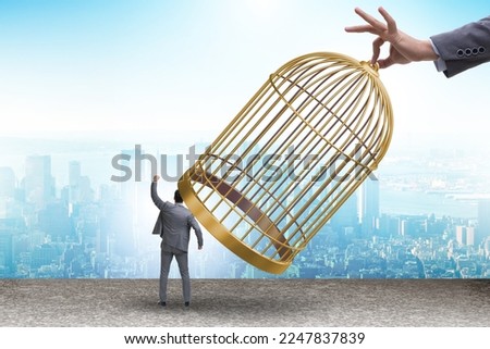 Business people and golden cage concept Royalty-Free Stock Photo #2247837839