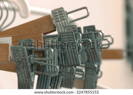 Close up image of rusty cloth hanger.
