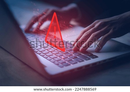 System hacked warning alert on notebook (Laptop). Cyber attack on computer network, Virus, Spyware, Malware or Malicious software. Cyber security and cybercrime. Compromised information internet. Royalty-Free Stock Photo #2247888569