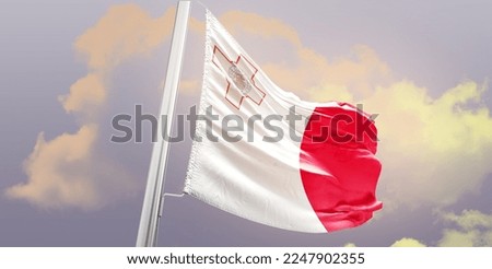 Waving Flag of Malta in the Sky. The symbol of the state on wavy cotton fabric. Royalty-Free Stock Photo #2247902355