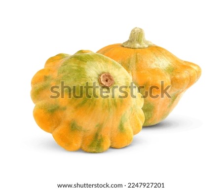 Two fresh yellow pattypan squashes on white background Royalty-Free Stock Photo #2247927201