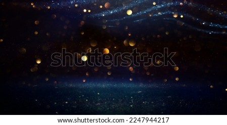 background of abstract glitter lights. gold, blue and black. de focused Royalty-Free Stock Photo #2247944217