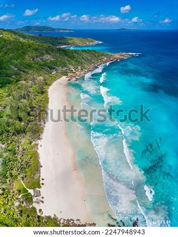 Aerial panoramic view of Beach Petite Anse, La Digue, Seychelles Royalty-Free Stock Photo #2247948943