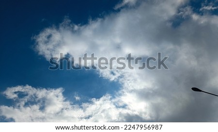 Background texture of blue sky ,white cloud,with street light.