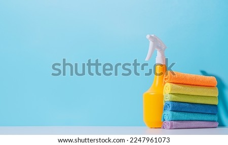 spring cleaning concept. detergent bottle and sponges for cleaning
