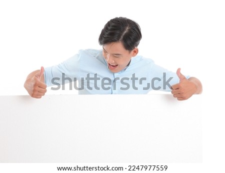 Portrait photo of a young handsome cheerful smile adult man, hold a blank empty white card with copy space to write message on, isolated on white background. Concept of promote a content.