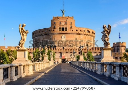 Castle and bridge of the Holy Angel at sunrise, Rome, Italy Royalty-Free Stock Photo #2247990587