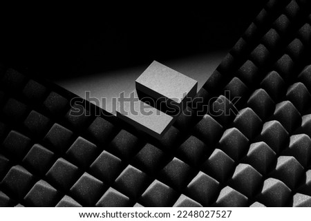 Branding stacks business cards mockup template on a black soundproof foam background with deep shadows, real photo. Blank isolated to place your design. 