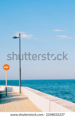 sea minimalist urban signs at the town seashore