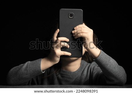 The problem of children's addiction to gadgets, online and screen time. Royalty-Free Stock Photo #2248098391