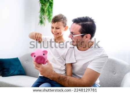 A Family with piggy bank and money at home
