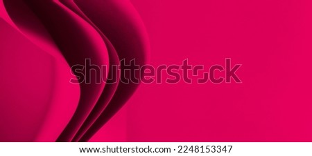 Abstract colored paper geometry composition monochrome background in viva magenta color with curved lines and shapes