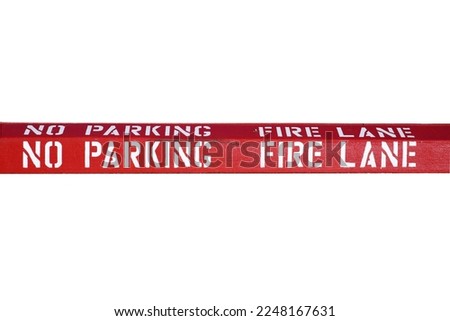 NO PARKING  FIRE LANE.  Red No Parking, Fire Lane curb in a parking lot. Emergency No Parking Lane. Fire Department and Police Access Only area. Red Fire Lane.  Warning Sign. Isolated on white. 