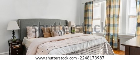Styled Home Still Lifestyle Image. Vintage Decorated Bedroom with Throw Pillows. Social Media Banner.