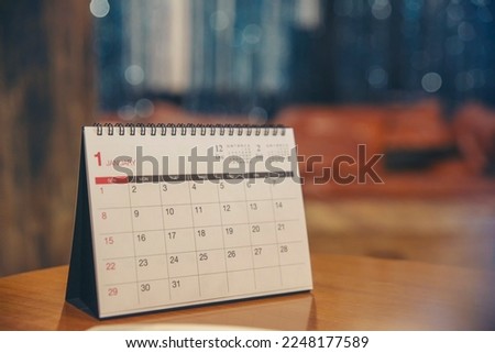 Calendar desk placed on business table. Desktop Calender for Planner to plan agenda, timetable, appointment, organization, management each date, month, and year on office table.Calendar 2023 Concept.