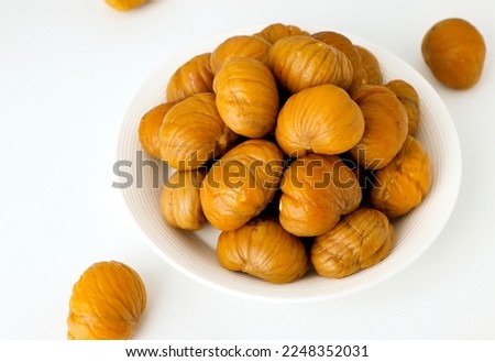 Peeled cooked chestnut snack snack illustration on white background Royalty-Free Stock Photo #2248352031