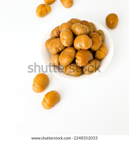 Peeled cooked chestnut snack snack illustration on white background Royalty-Free Stock Photo #2248352033
