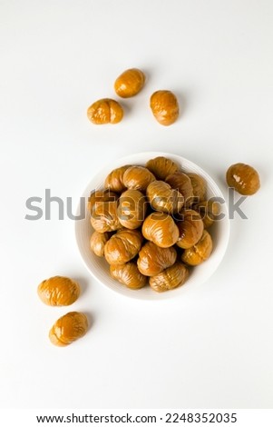Peeled cooked chestnut snack snack illustration on white background Royalty-Free Stock Photo #2248352035