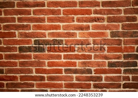 Orange brick wall can be used as background.
