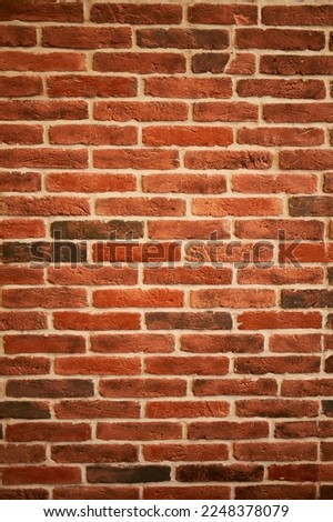 Orange brick wall can be used as background.