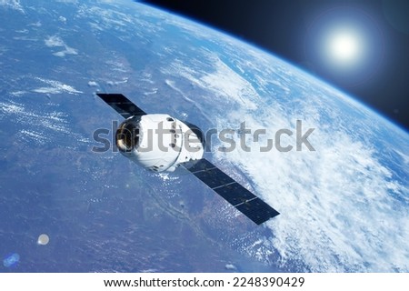Space shuttle above the surface of the Earth. Elements of this image furnished by NASA. High quality photo