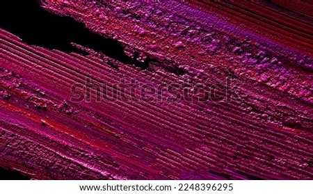 Lipstick pink red fuchsia metallic smudge background texture on black
