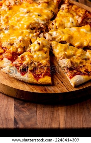 Pizza. Cheese Pizza. Traditional New York City style margarita pizza pie with a thin homemade crispy crust, tomato, garlic, marinara sauce topped with buffalo mozzarella cheese and fresh basil leaves. Royalty-Free Stock Photo #2248414309