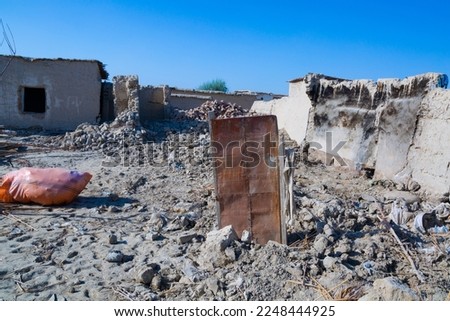 Broken houses in Quetta, Pakistan. Destroyed in 2022 flood Royalty-Free Stock Photo #2248444925