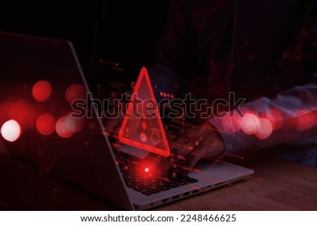 System hacked warning alert on notebook (Laptop). Cyber attack on computer network, Virus, Spyware, Malware or Malicious software. Cyber security and cybercrime. Compromised information internet. Royalty-Free Stock Photo #2248466625